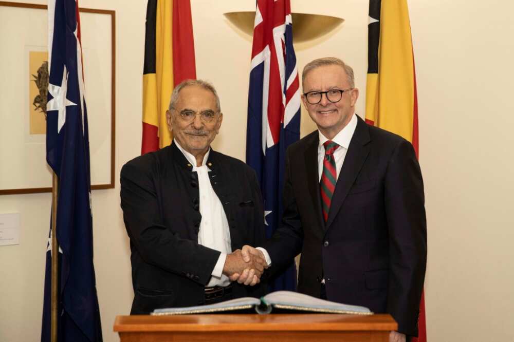 East Timor President Jose Ramos-Horta (L) shakes hands with Australia's Prime Minister Anthony Albanese in Canberra on Wednesday