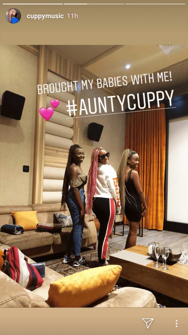 DJ Cuppy rents whole cinema to watch movie with her friends (photos)