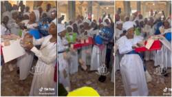 Big Nigerian ladies spray N1000 notes on their spiritual mother in church, video goes viral
