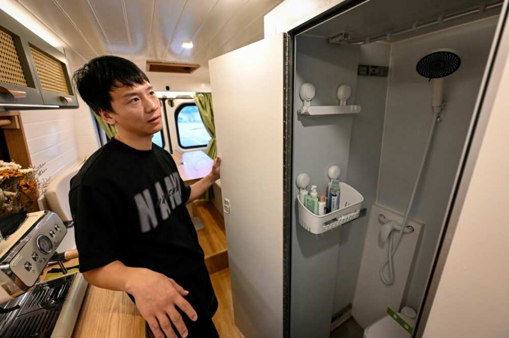 Zhang Xi started living in an RV with his partner last May before opening a van renovation workshop