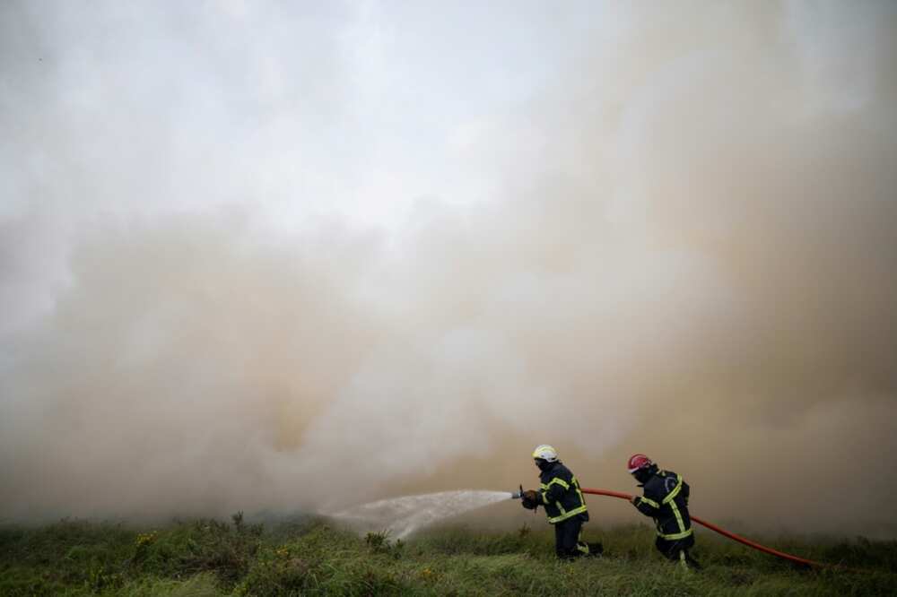 Cooler air swept into western Europe helping to bring fires under control