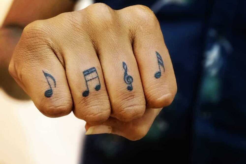 music symbols tattoos for men