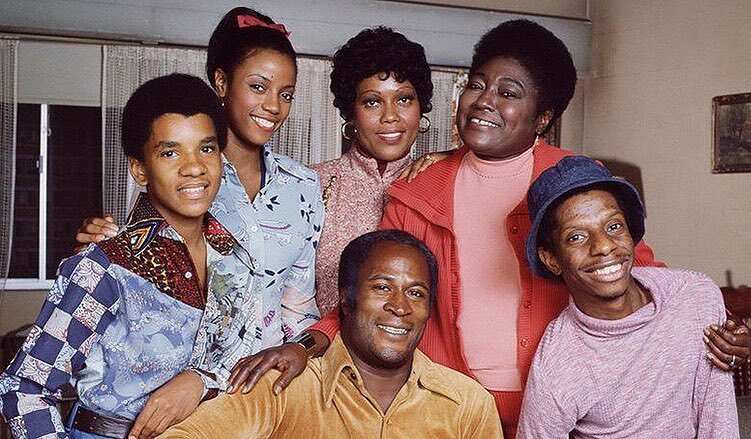 How old is John Amos?