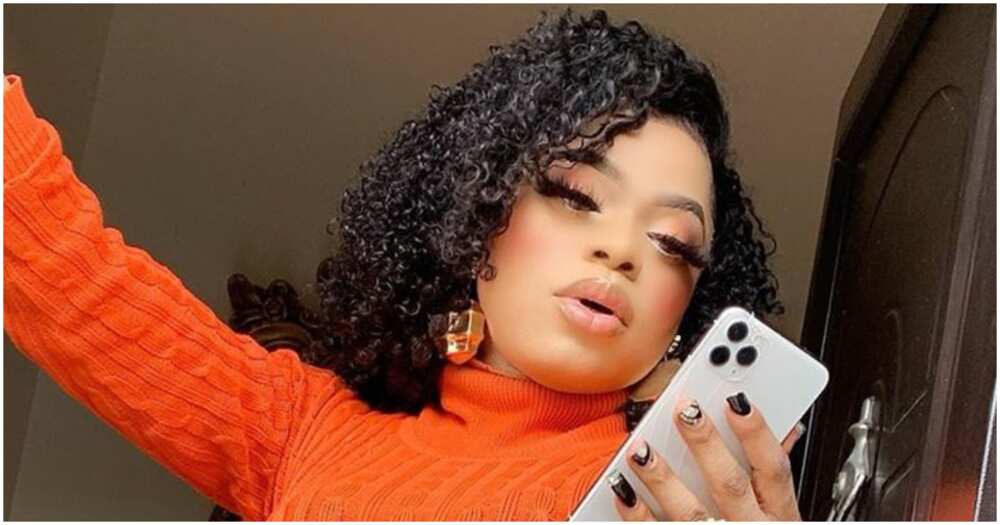 Bobrisky abandons his cross-dressing ways as he attends dad's birthday dressed as a man (video)