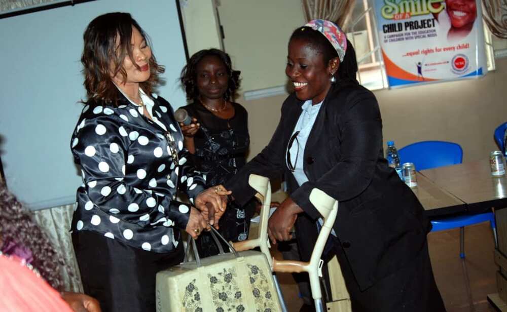 Beneficiary receiving starter pack after training from Enabled to Enabled. 
Photo Credit: Enabled to Enable