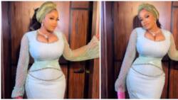 Lady in tight corset style trends online in viral video: "Who dey breathe?"