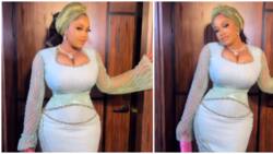 Lady in tight corset style trends online in viral video: "Who dey breathe?"