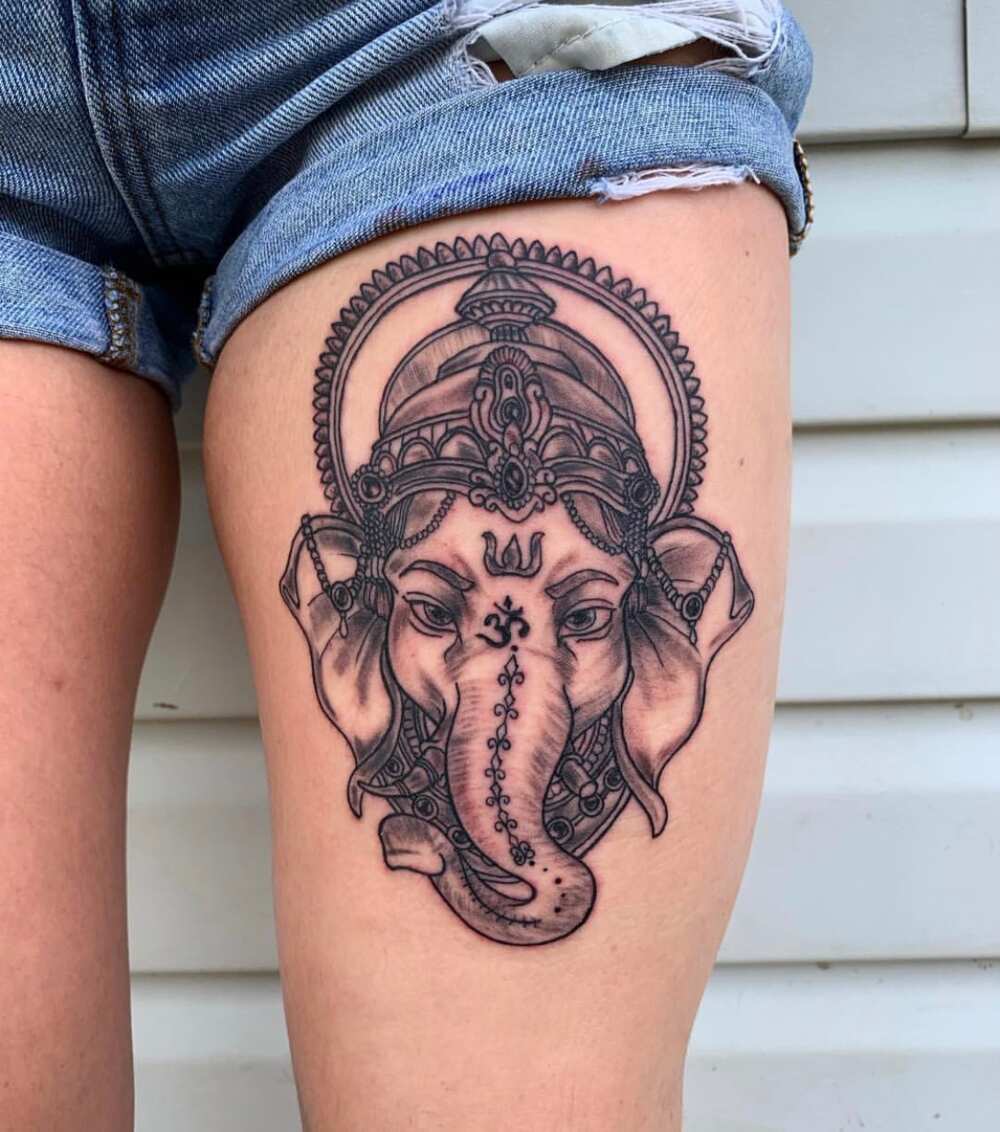 Elephant thigh tattoo