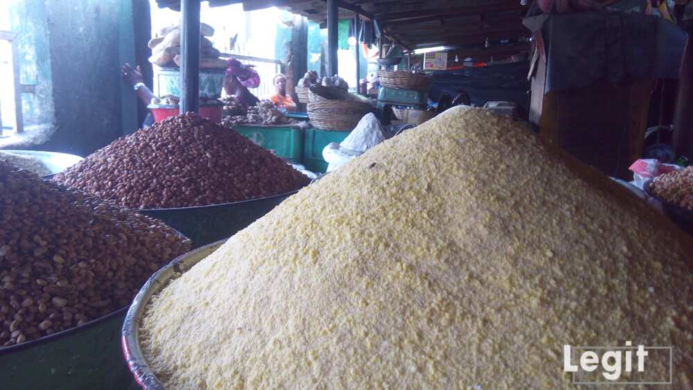 Sellers disclose the reduction in the cost price of some goods in the market. Photo credit: Esther Odili