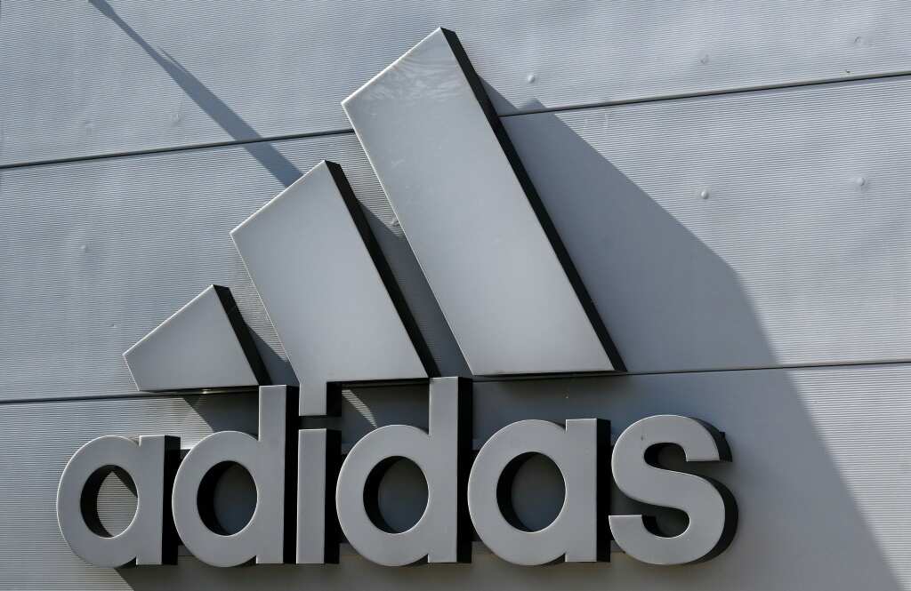 Adidas shares slide following China corruption claims