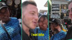 "You're my husband": Nigerian mum with kids rushes oyinbo man in market, begs him to marry her