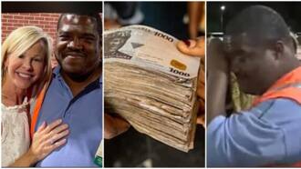 "It will help me": Store attendant who has worked for over 20 years receives N13.3m cash gift, photos emerge