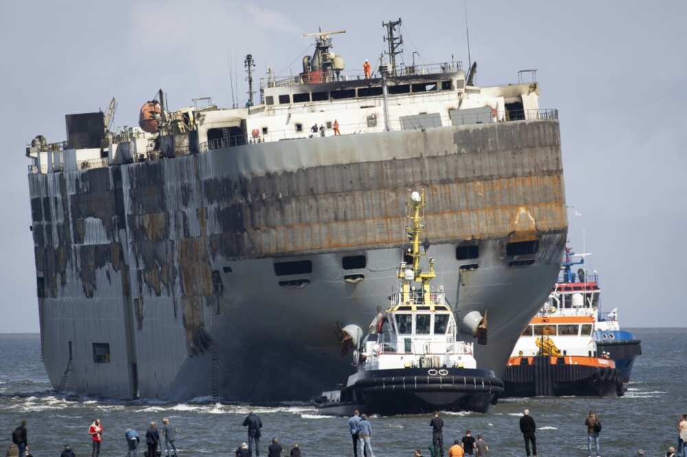 The fire-stricken ship was carrying more than 3,700 vehicles including almost 500 electric cars
