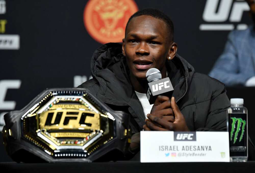 Nigerian-born UFC fighter Adesanya gifts mum Porshe SUV worth over N50m ahead of bout against Blachowicz