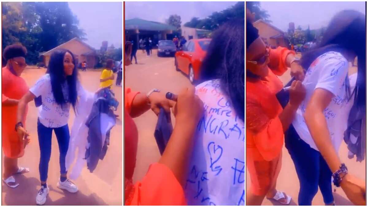 Video shows lovely moment Nigerian mother signs on her daughter's shirt as she graduates from university