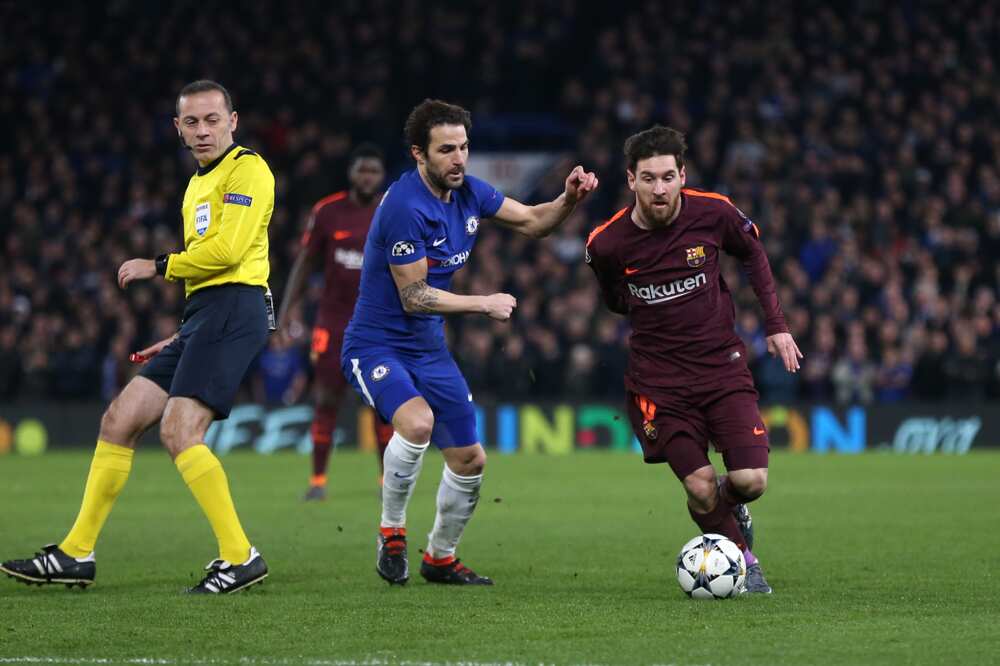 Cesc Fabregas and Lionel Messi.