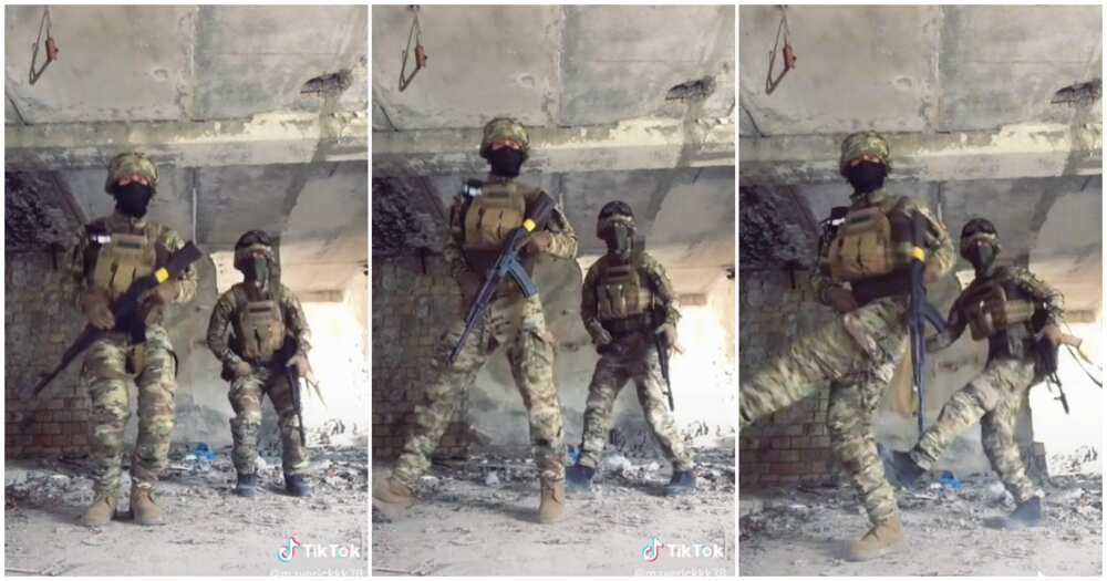 Ukraine soldiers dance with guns, soldiers dance video, Ukraine solfiers dance, dance video of soldiers, uncompleted building