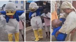 After living abroad for 10 years, man returns to Nigeria in cartoon costumes, surprises his family