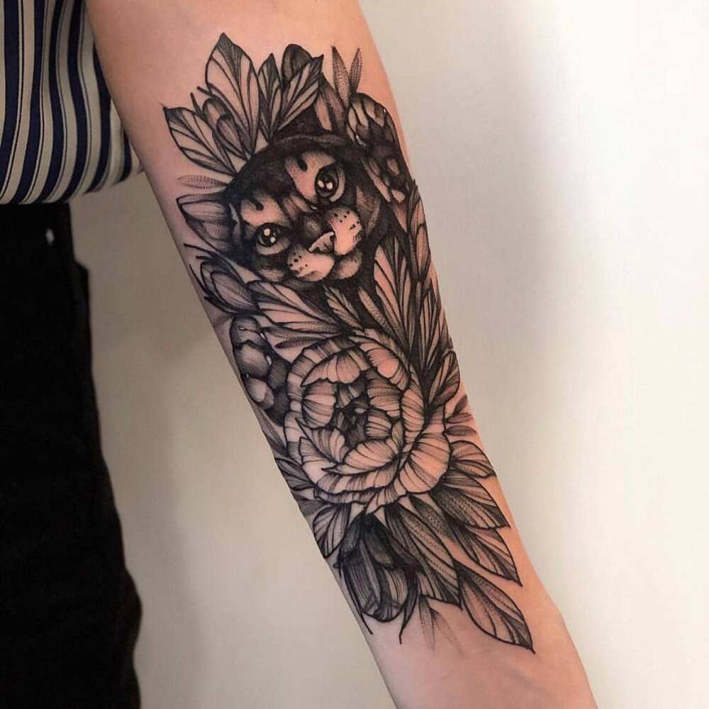 inner arm tattoo