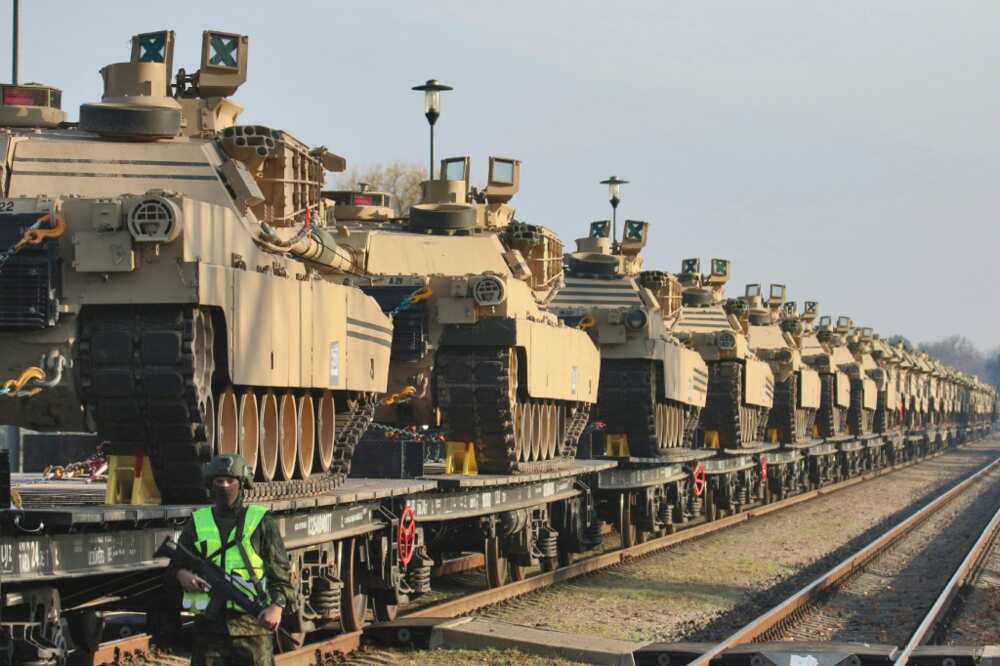 Abrams tanks are seen at the railway station near the Pabrade military base in Lithuania on October 21, 2019 as the United States began deploying a battalion