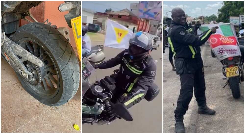London to Lagos biker, Kunle Adeyanju laments a punctured tyre in Lome, Togo.
