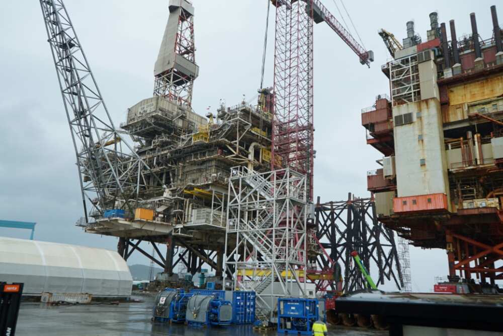 Three gigantic disused platforms are being taken apart bit by bit