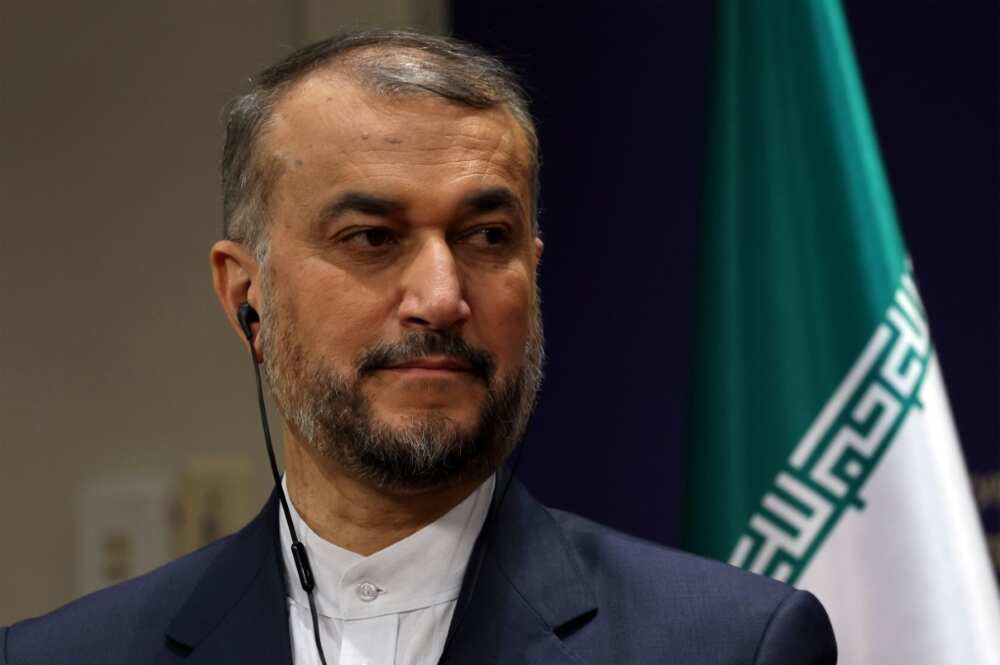 Iranian Foreign Minister Hossein Amir-Abdollahian shows off the tie-less look that remains de rigeur for government officials and other state employees