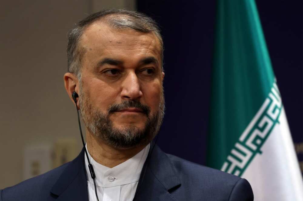 Iranian Foreign Minister Hossein Amir-Abdollahian shows off the tie-less look that remains de rigeur for government officials and other state employees Iranian Foreign Minister Hossein Amir-Abdollahian shows off the tie-less look that remains de rigeur for government officials and other state employees