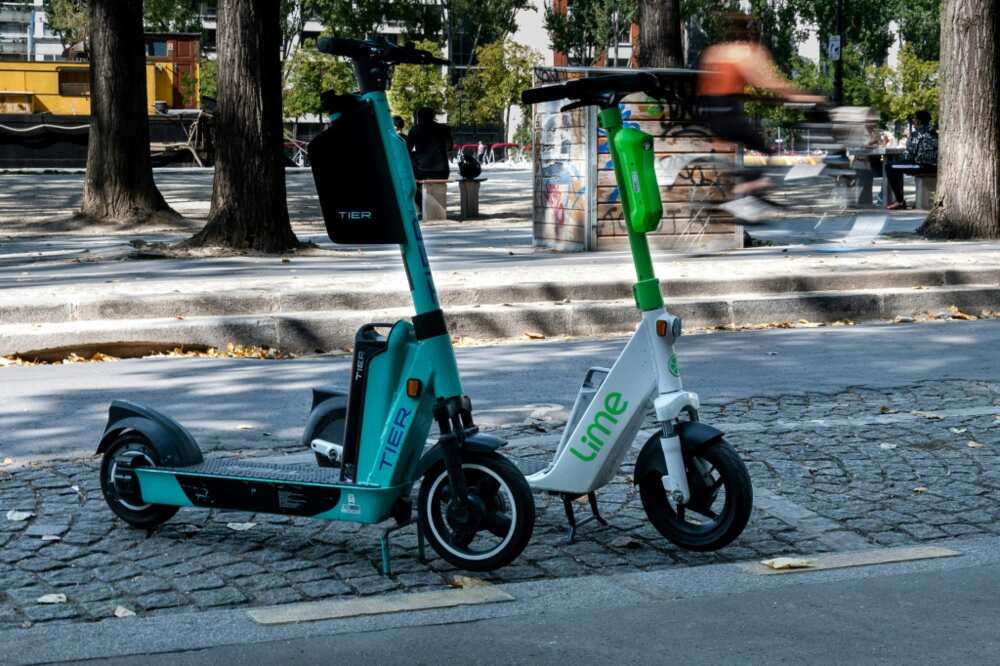 Critics say the proliferation of rental e-scooters has clogged up public pavements Critics say the proliferation of rental e-scooters has clogged up public pavements
