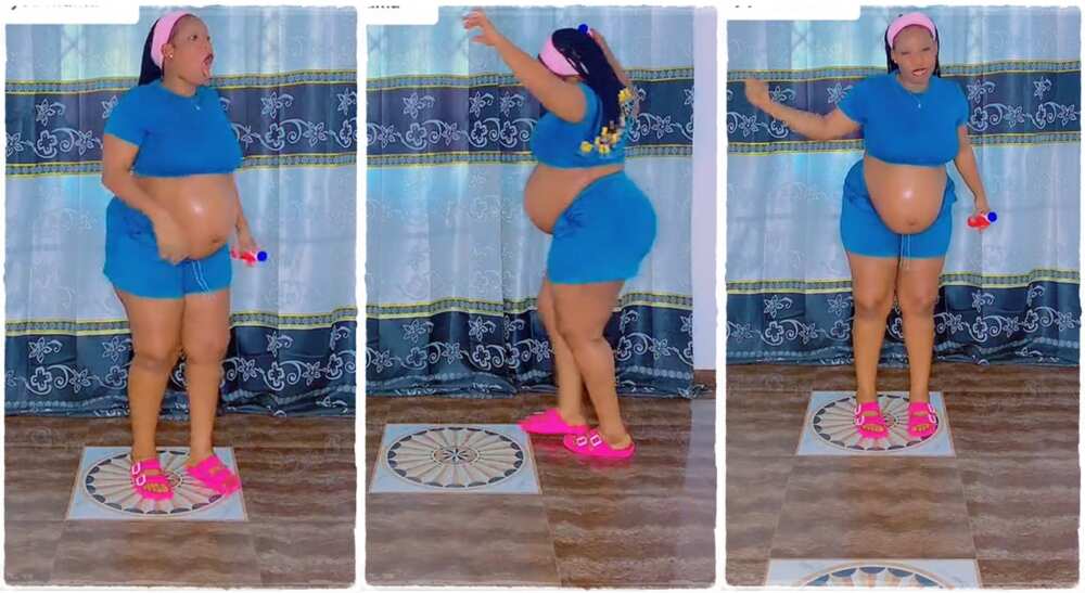Pregnant woman dancing inside her room. Pregnant woman dancing inside her room.