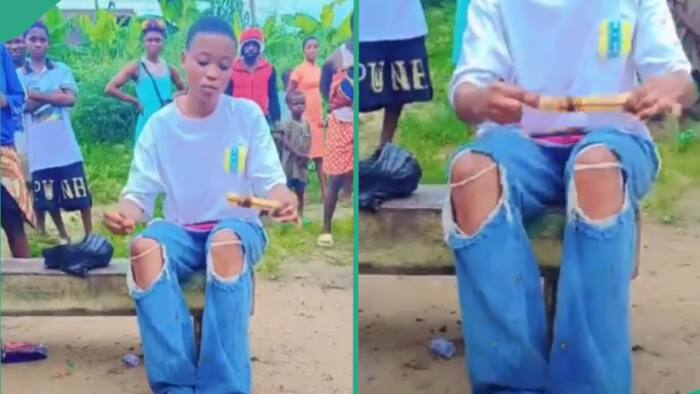 Nigerian lady forced to untie man she 'caged' with charm, people gather around her in trending video