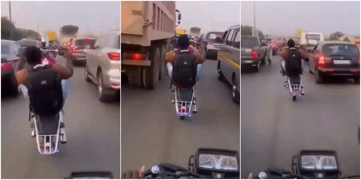 For this Nigerian road? Massive reactions as video shows man doing risky stunts with bike