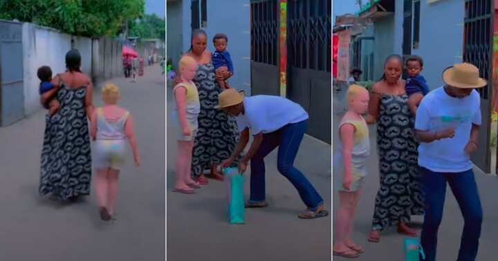 Lady dances for albino, gifts her some items in video