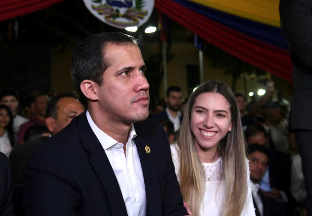 Venezuelan opposition leader Juan Guaido, considered interim president by the United States, attends a February 2020 rally alongside his wife Fabiana Rosales, who has met President Joe Biden at the White House