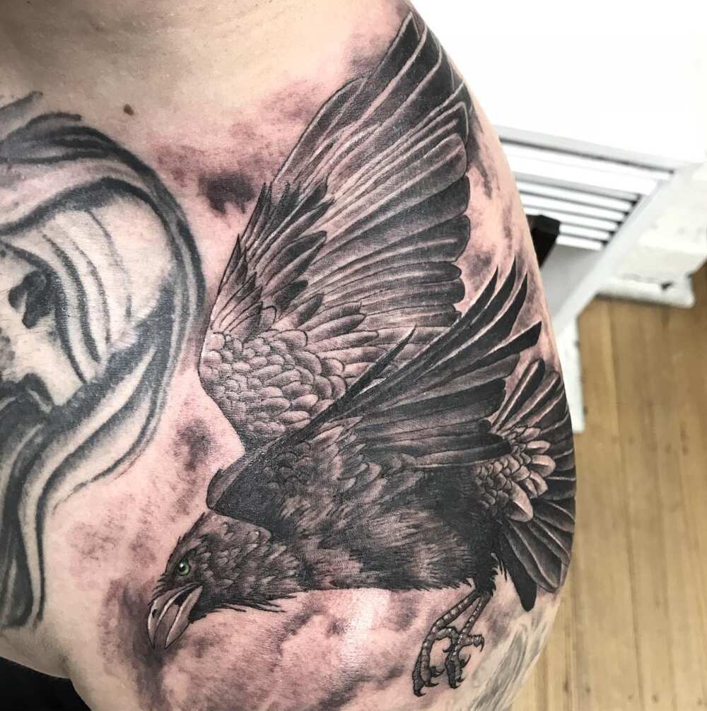 raven feather tattoo