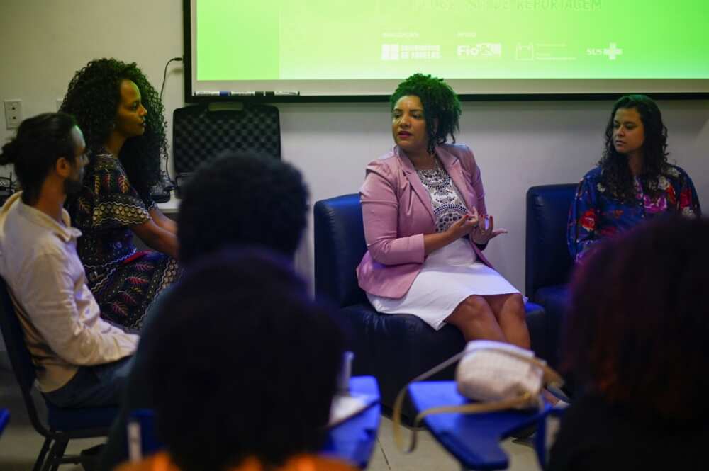 Rio de Janeiro state congresswoman and re-election candidate Renata Souza (C), of the Socialism and Freedom Party (PSOL), takes part in a meeting at the Favela Observatory Center of Mare favela, in Rio de Janeiro, Brazil, on September 02, 2022 Rio de Janeiro state congresswoman and re-election candidate Renata Souza (C), of the Socialism and Freedom Party (PSOL), takes part in a meeting at the Favela Observatory Center of Mare favela, in Rio de Janeiro, Brazil, on September 02, 2022