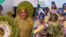 Asoebi ladies unveil bride dressed in a glamorous trad outfit, netizens react: "She is beautiful"