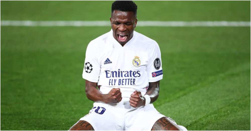 Vinicius Junior celebrates scoring a goal during the UEFA Champions League Quarter Final match against Liverpool FC at Estadio Alfredo Di Stefano on April 06, 2021 in Madrid, Spain. (Photo by Fran Santiago/Getty Images)