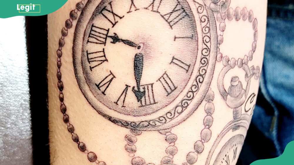 Clock with a twist tattoo