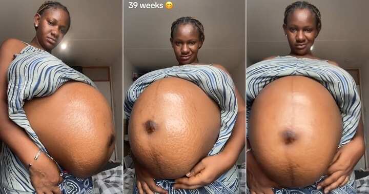 Nigerian woman displays her huge baby bump