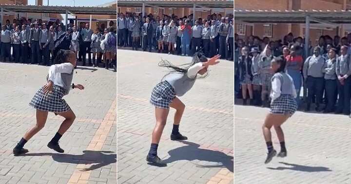 Girl dances with energy on assembly ground