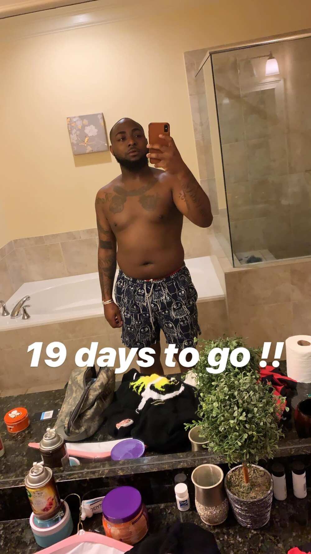 Davido works out hard to lose belly fat (photos)