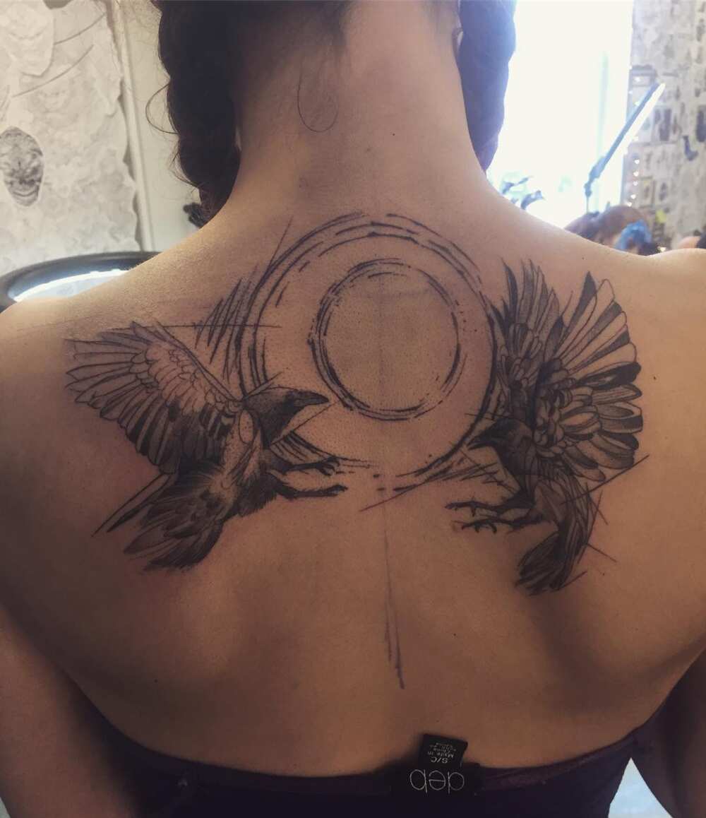 Raven tattoo: meaning and 50 design ideas - Legit.ng