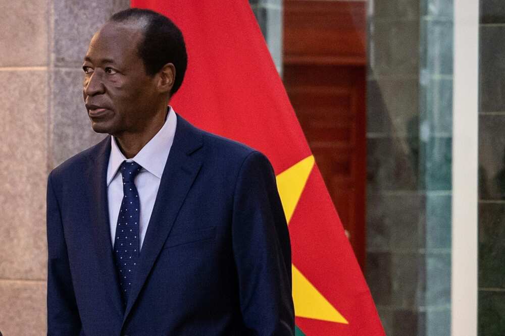 Compaore, pictured at the presidential palace in Ouagadougou on July 8, during his brief return to the country