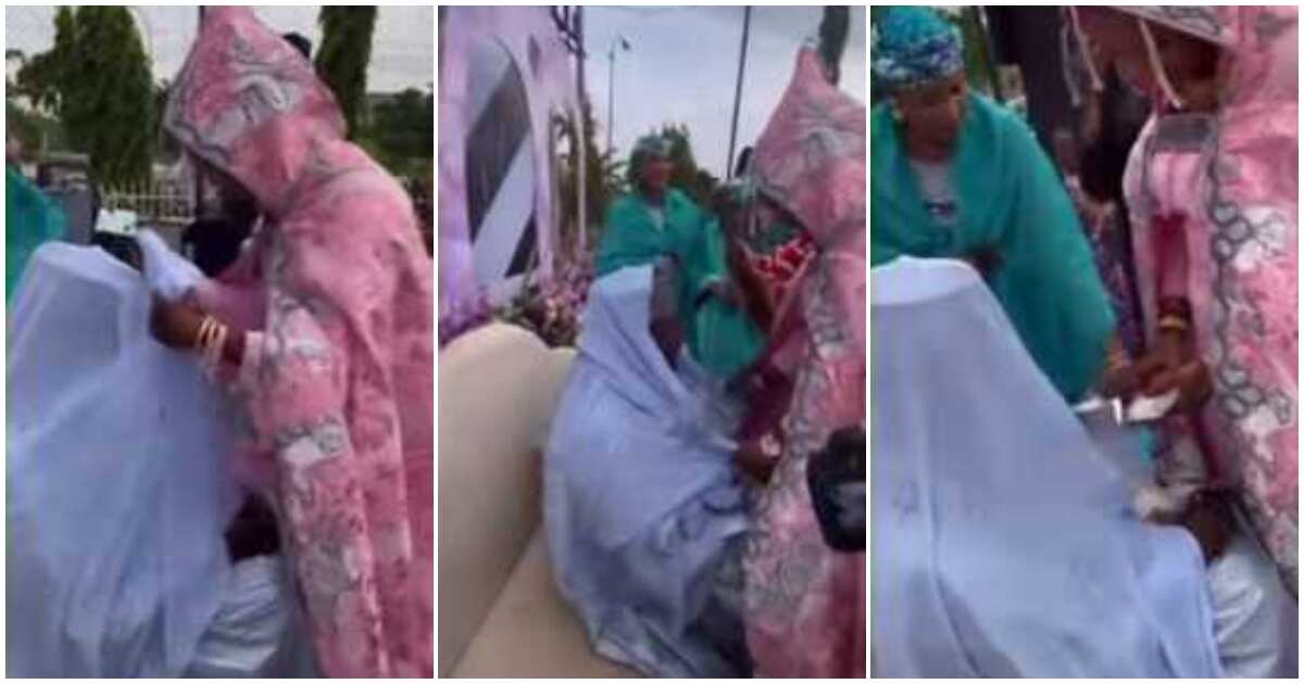 Lady 'marries her man,' unveils his covered face after spraying him money at wedding, video goes viral