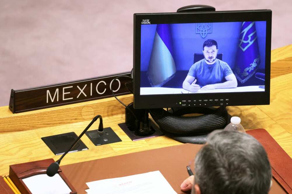 Mexico's UN ambassador Juan Ramon De La Fuente Ramirez listens as Ukrainian President Volodymyr Zelensky addresses a UN Security Council meeting at the UN Headquarters to discuss the conflict in Ukraine on September 27, 2022