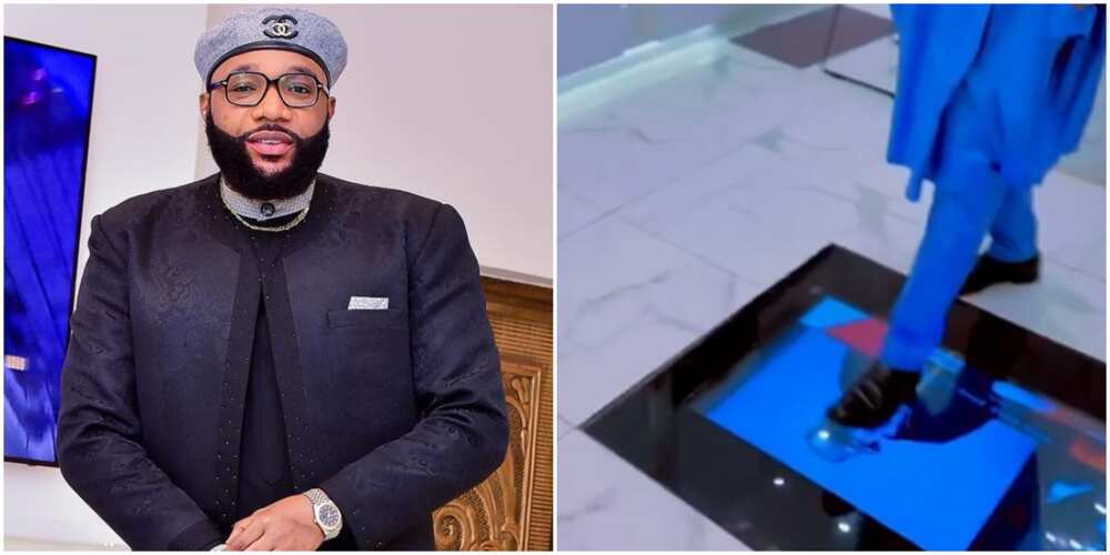 E-Money walks stylishly on top of TV installed inside his kitchen floor