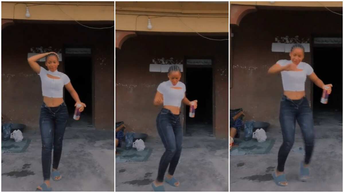 See this amazing video showing a pretty lady dancing in front of her old house