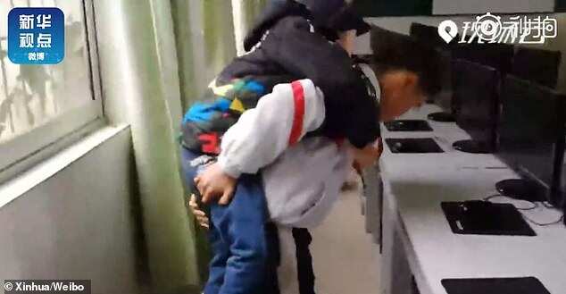 12-year-old schoolboy carries disabled friend to class daily for 6 years (photos)