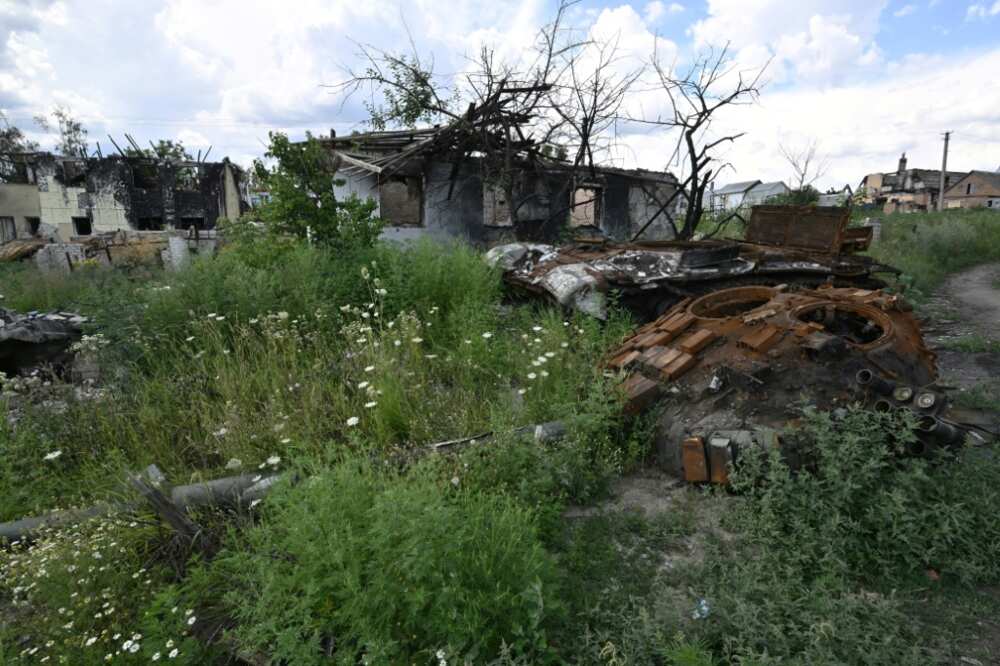 Months after Moscow's army were forced from the village of Mala Rogan in the Kharkiv region of Ukraine, their ruined military equipment remains strewn between damanged homes